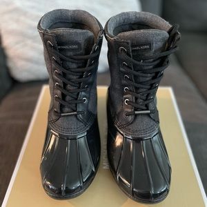 Woman’s Michael Kors rain boots